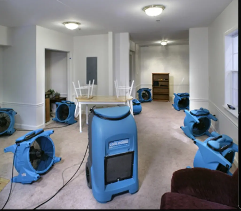 Air movers and dehumidifier setup for Water Damage Restoration in San Elizario