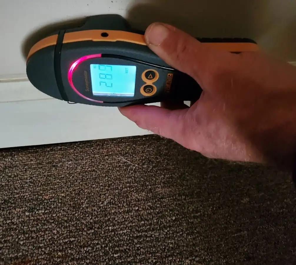 Moisture detection at baseboard during Mold Inspection & Testing in San Elizario